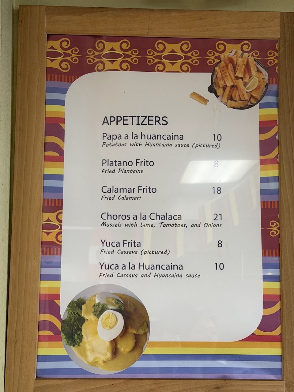Printed menu featuring saltado, chaufa, and fried plantains.